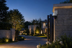 Illustrative Lorex Connect X Series PTZ camera installation at a luxury estate entrance
