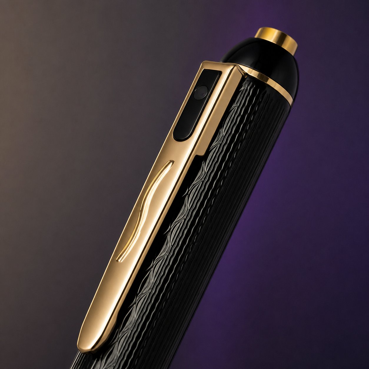 Close-up of the ClearVero Pen Camera black textured finish and gold-tone details