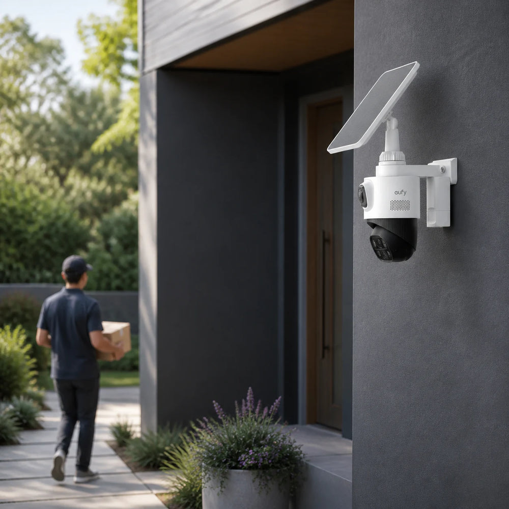 Courier approaching a front door beneath a mounted eufyCam S4 and solar panel
