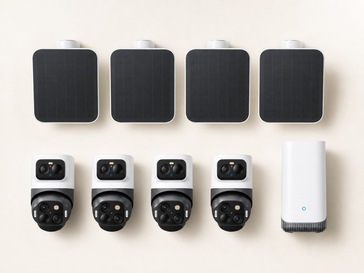 Core system flat lay with four cameras, four solar panels, and one HomeBase S380