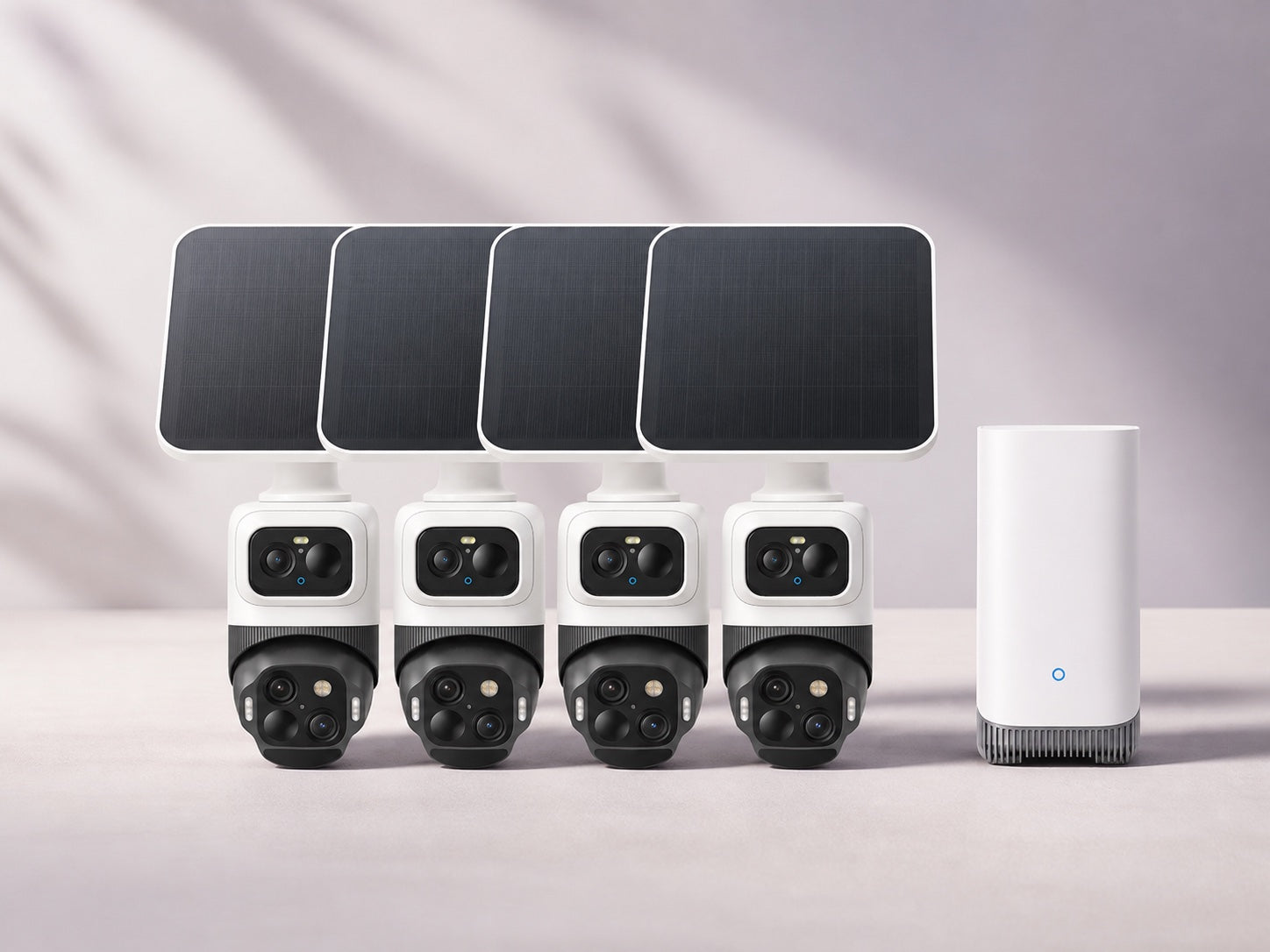 Four white eufyCam S4 cameras with four solar panels and HomeBase S380